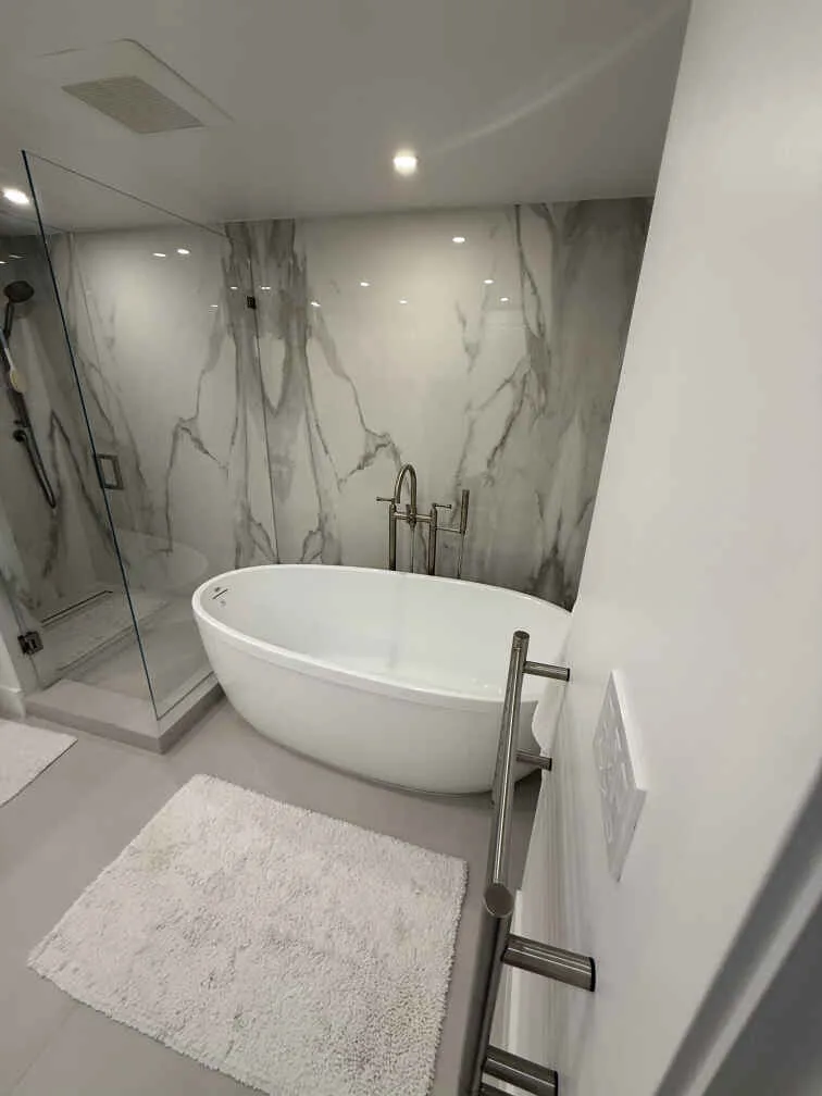 Remodeled shower with marble-look tile