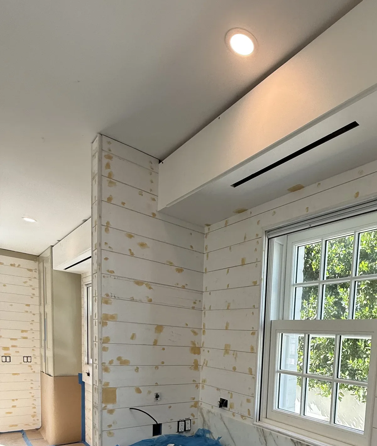 Walls patched, sanded and prepped before painting